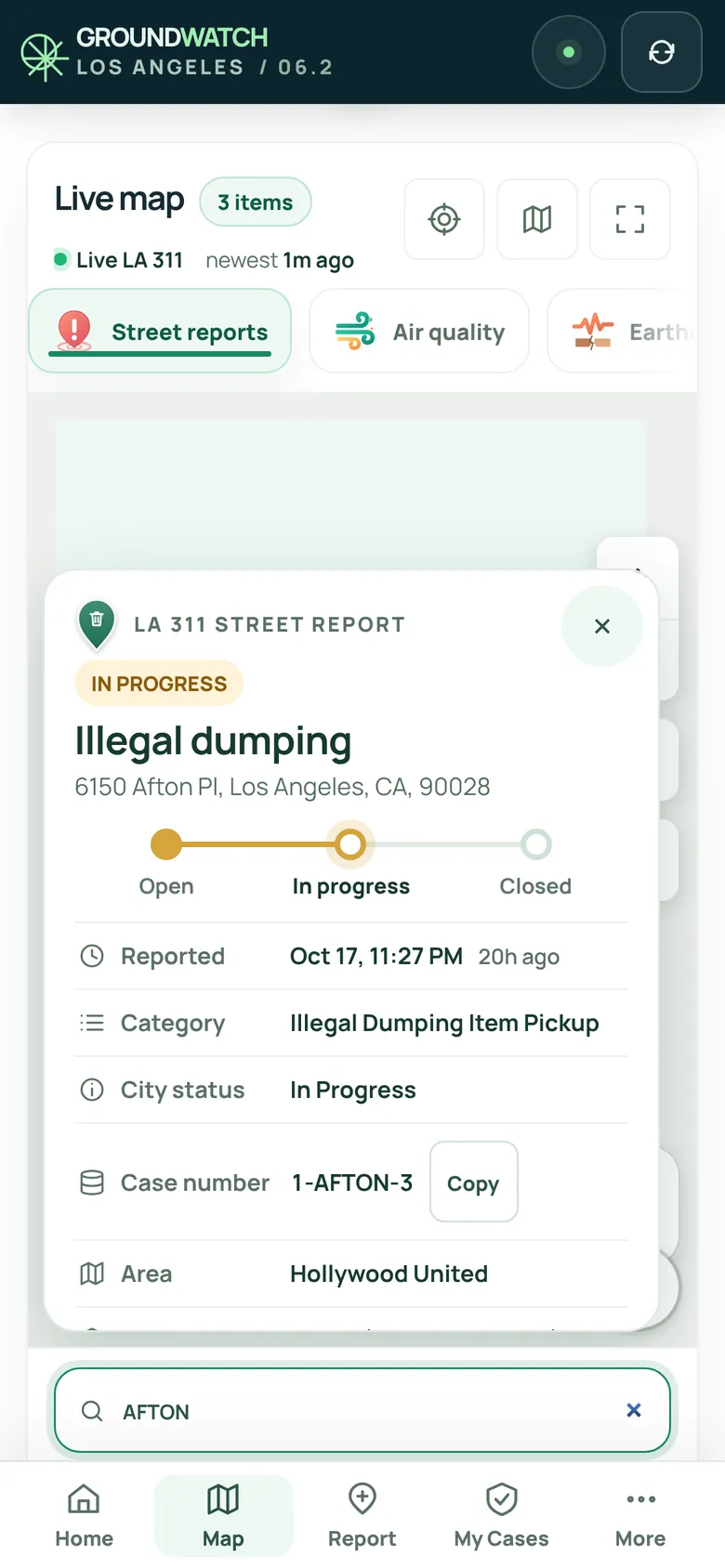 A street report's details on the map: illegal dumping at 6150 Afton Place, in progress, with the City's status and case number.