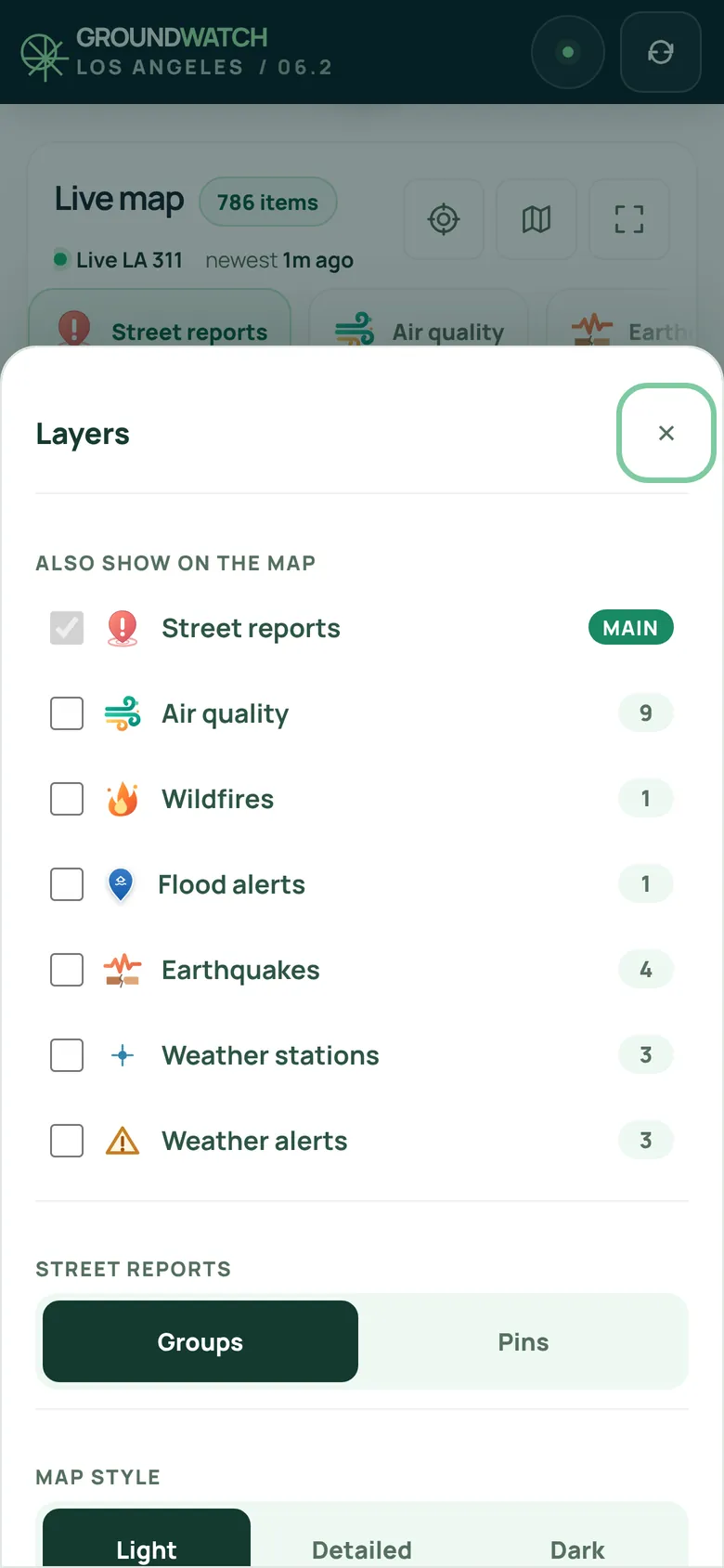 The Layers sheet on the map: street reports, air quality, wildfires, flood alerts, earthquakes, weather stations and weather alerts, with Groups or Pins and the map style.